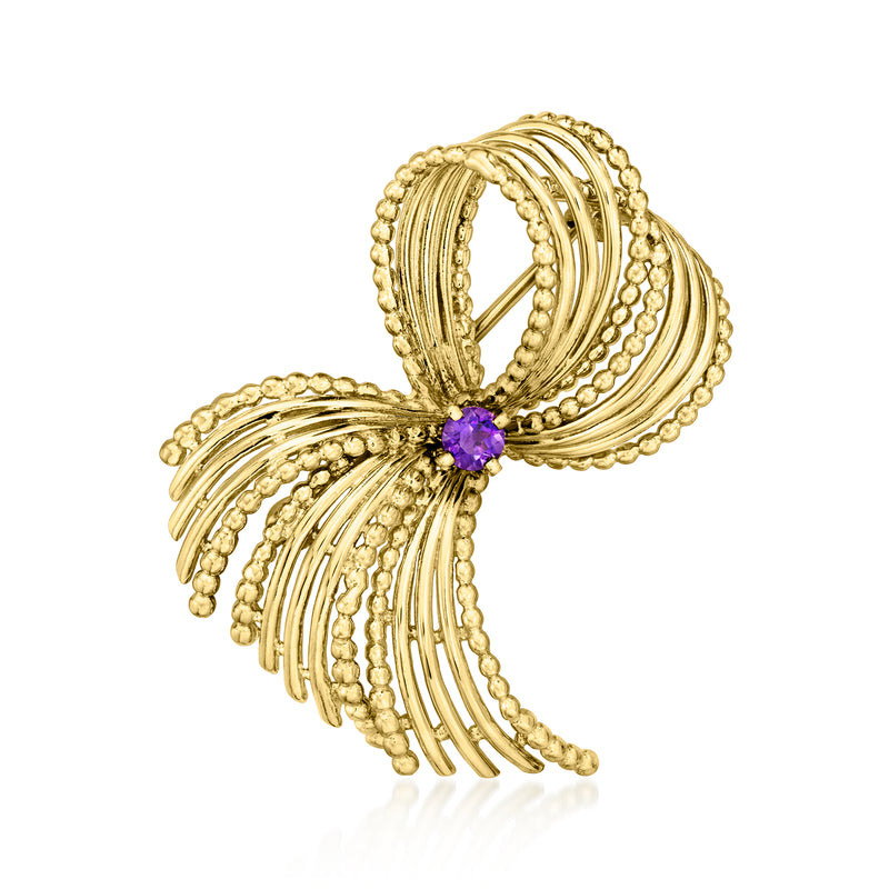 Amethyst ribbon pin in 18k yellow gold with bow-shaped bead and swirl detailing