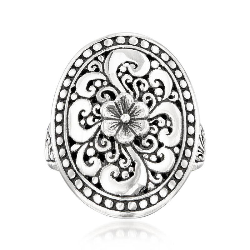 Sterling silver oval filigree ring with central flower and beaded border