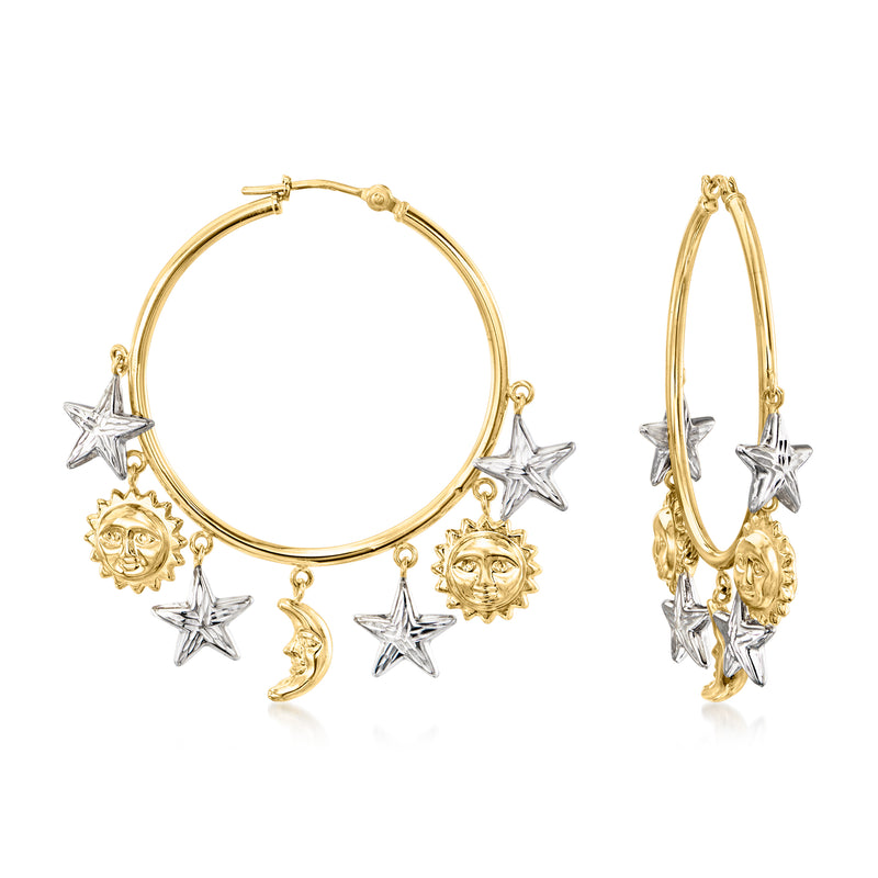 Two-tone gold hoop earrings with moon, stars, and sun face charms