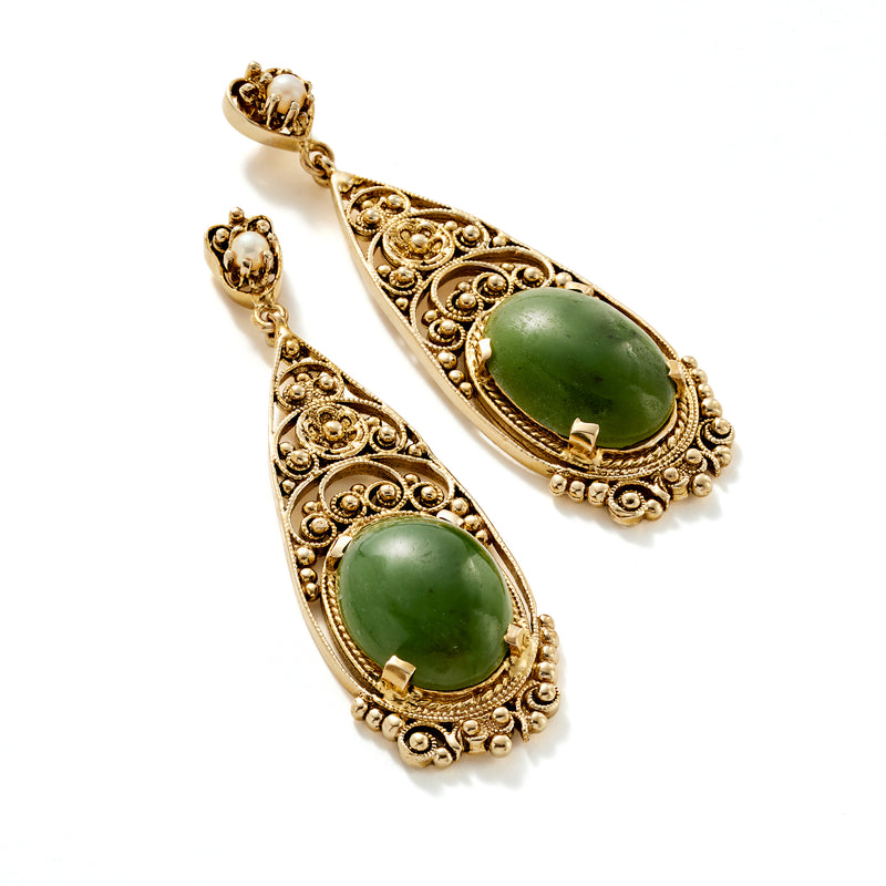Gold filigree drop earrings with oval green cabochon and small white pearl accents