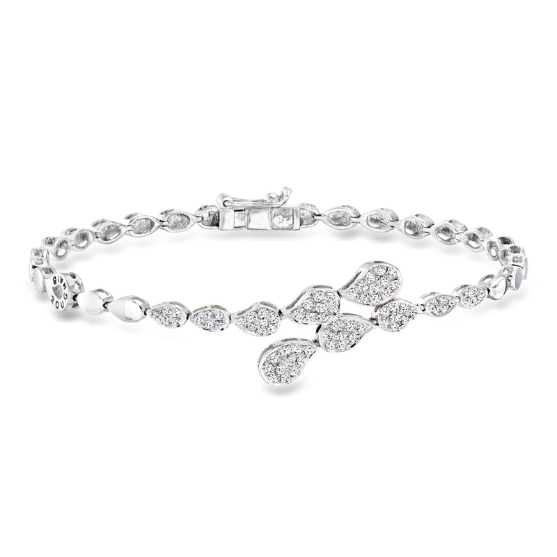 Vintage white gold diamond bracelet with bow motif and oval bezel-set links