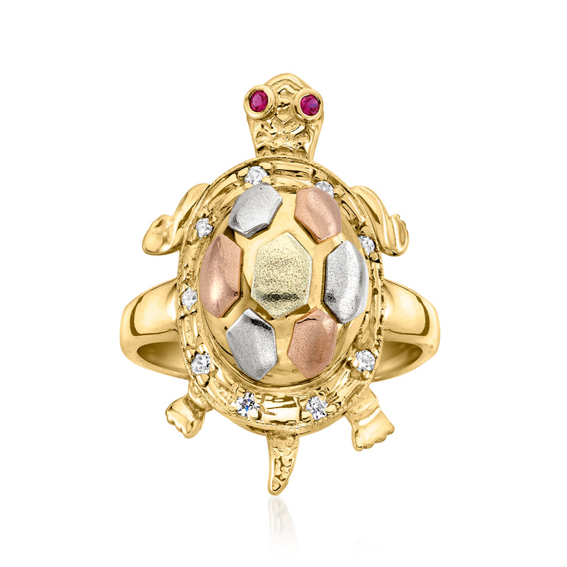 Vintage gold turtle-shaped ring with purple stones and clear CZ accents, polished finish.