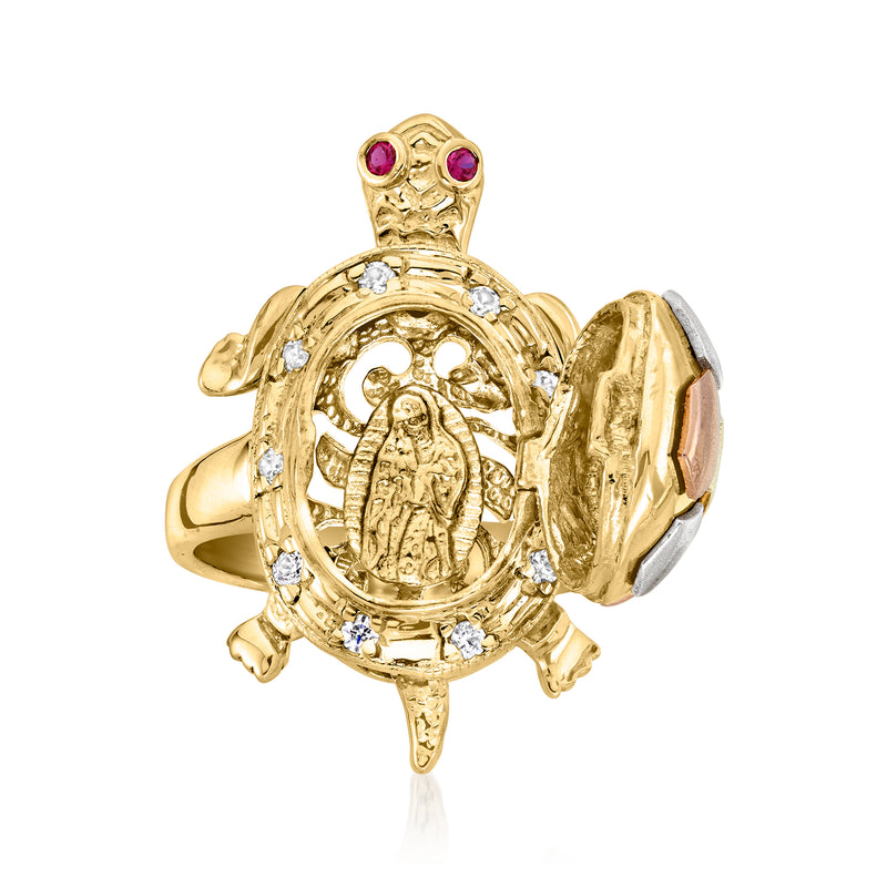 Gold turtle-shaped statement ring with red/purple stones, CZ borders, and engraved center.