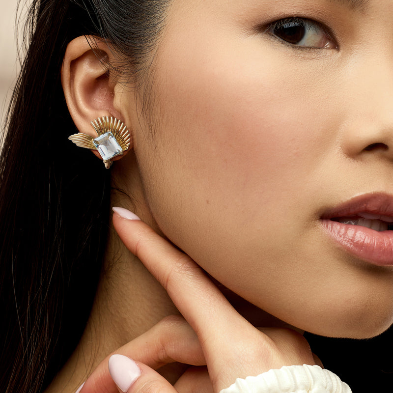 Aquamarine square fan earrings on model with 18kt yellow gold stud backs