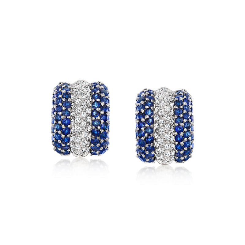 Curved hoop earrings with blue sapphire rows and white diamond center on white gold