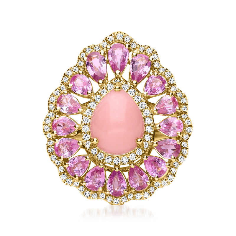 Yellow gold ring with oval pink gemstone, halo of pink stones and diamond accents
