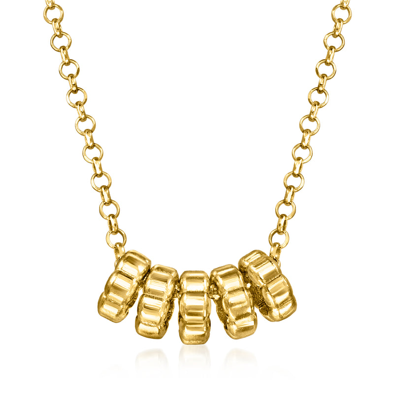 Gold over sterling charm necklace with linked chain and barrel bead charms