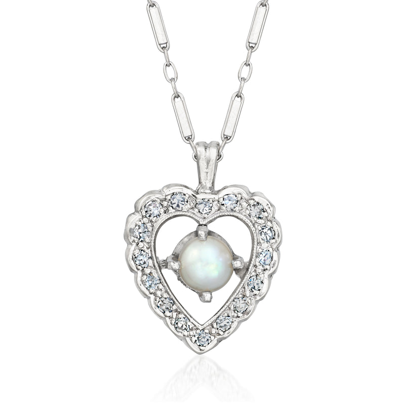 Heart pendant necklace with cultured pearl center and diamond halo in white gold