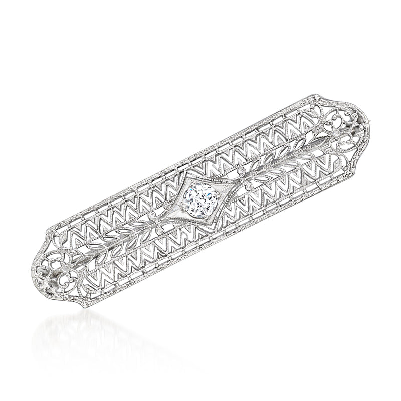 Vintage filigree diamond pin in 10kt white gold, rectangular setting with border