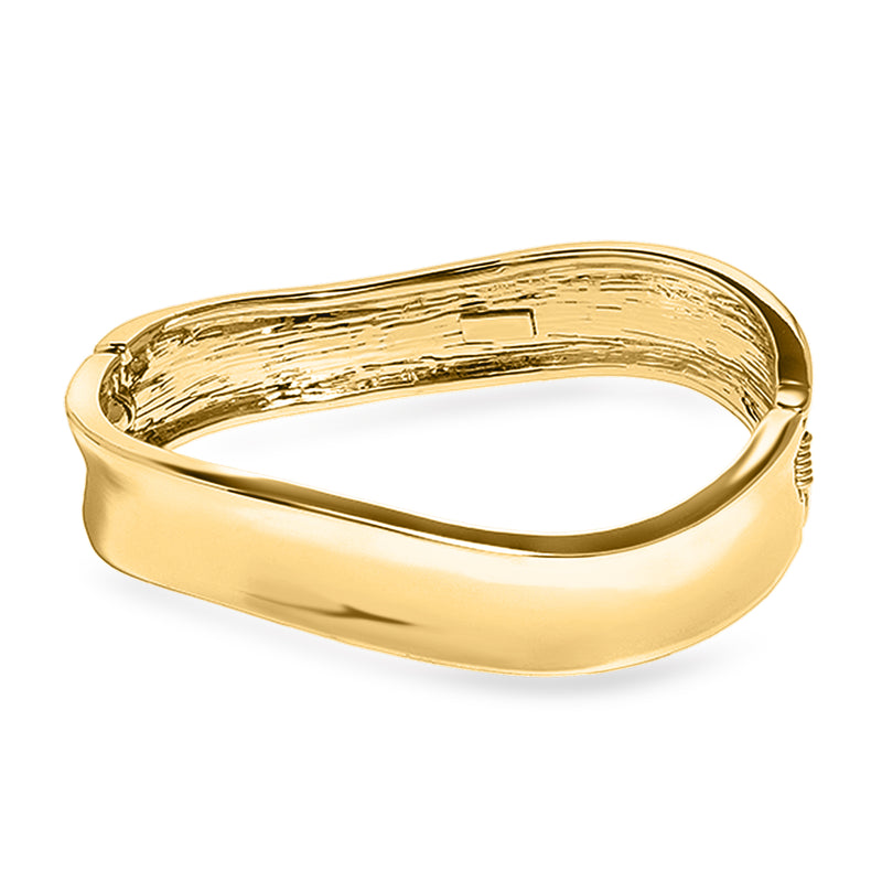 Yellow gold-plated wavy bangle bracelet with polished oval silhouette