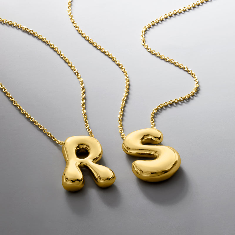 Gold-plated bubble letter initial pendants on necklaces with chains