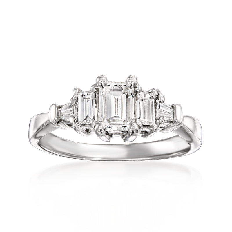 Platinum diamond ring with rectangular center stone and side baguette diamonds