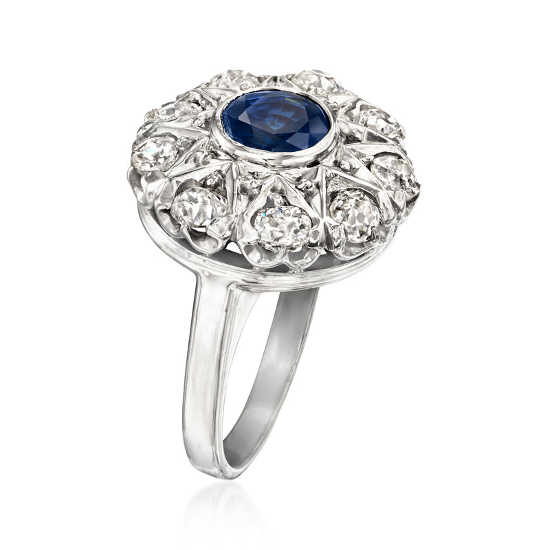 Vintage sapphire and diamond ring with blue round center stone, white gold band