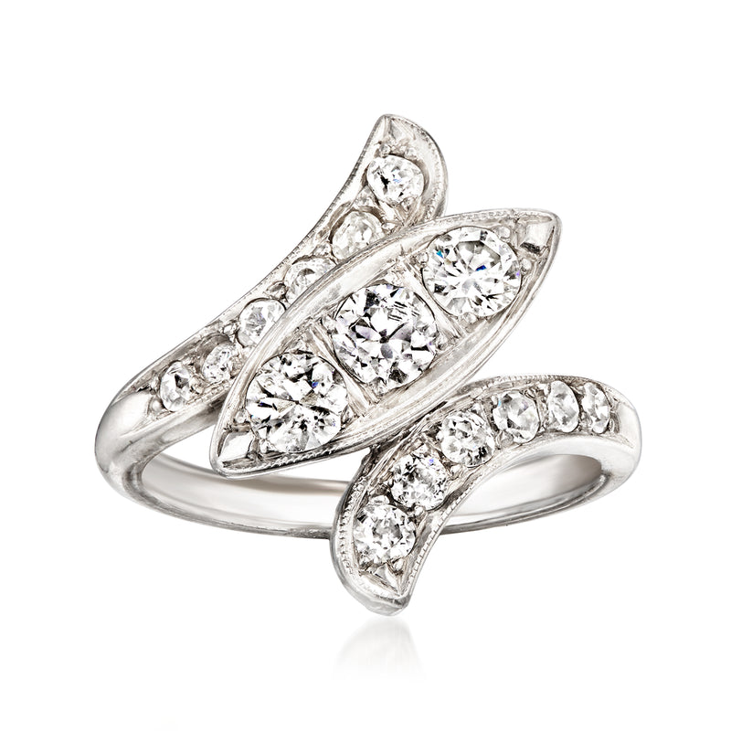 Palladium bypass ring with three oval diamond clusters and smaller round diamonds
