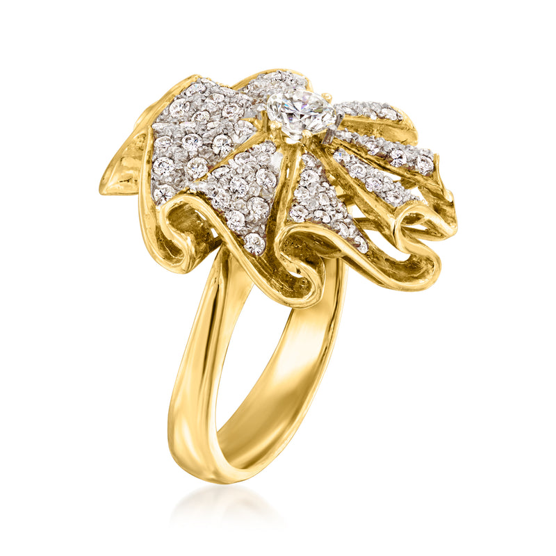 Yellow gold diamond cluster ring, side view with prong-set round center stone.