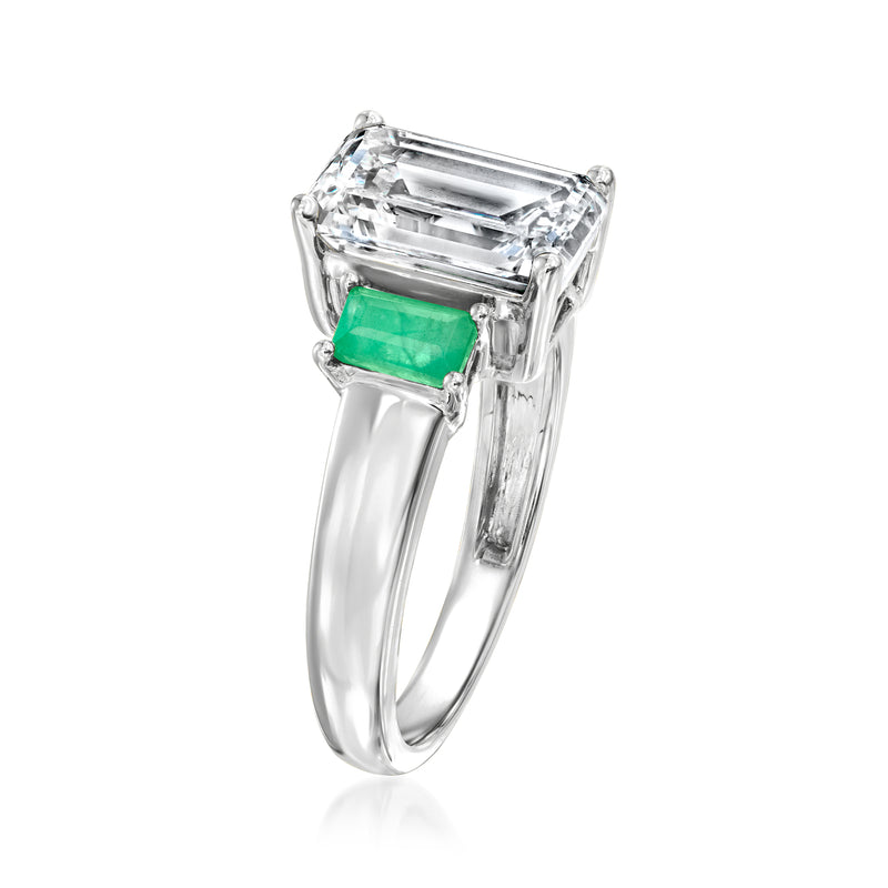 14kt white gold ring with emerald green stones and a square emerald-cut center diamond