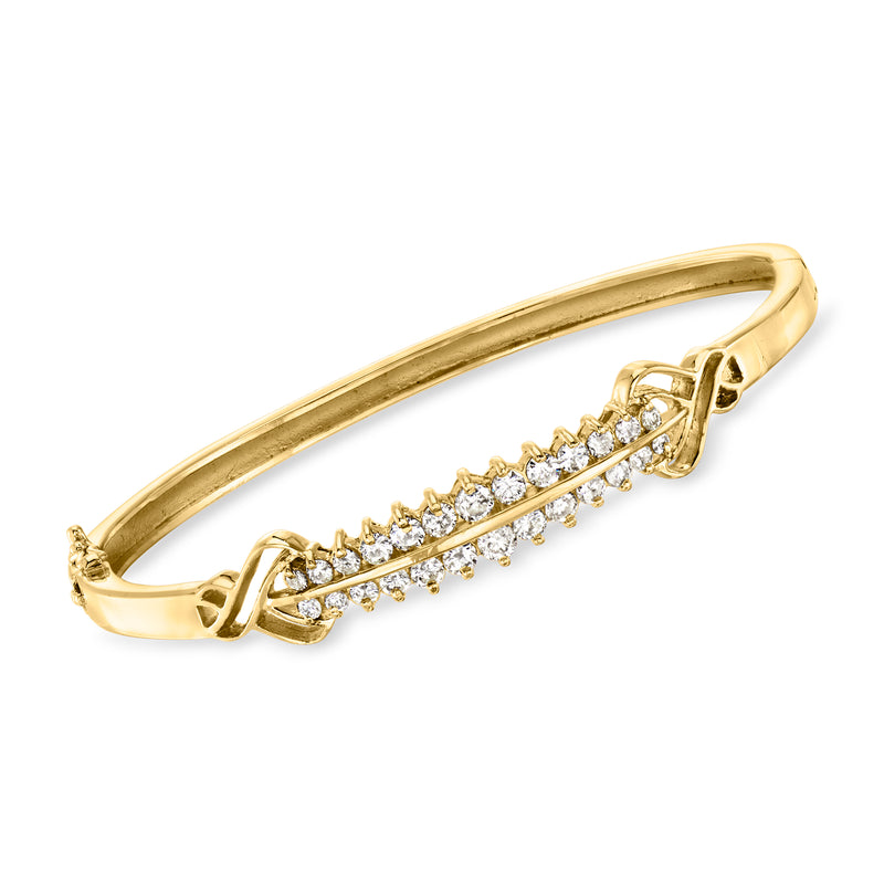 14kt yellow gold vintage diamond bangle bracelet with a row of small round stones