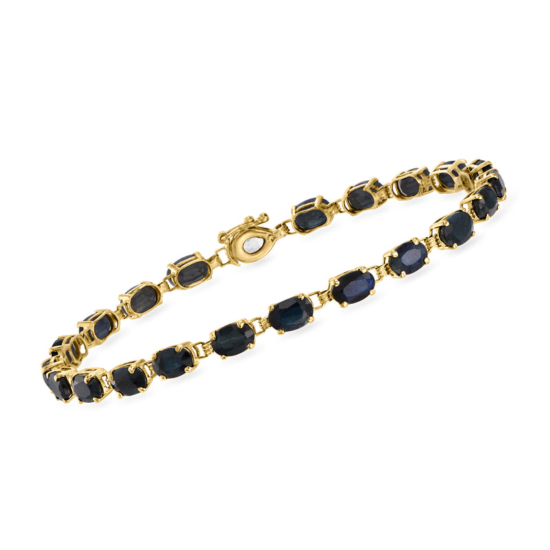 10kt yellow gold sapphire bracelet with oval dark-blue stones