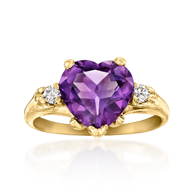 Heart amethyst and diamond ring in 14kt yellow gold, with three round diamond accents.