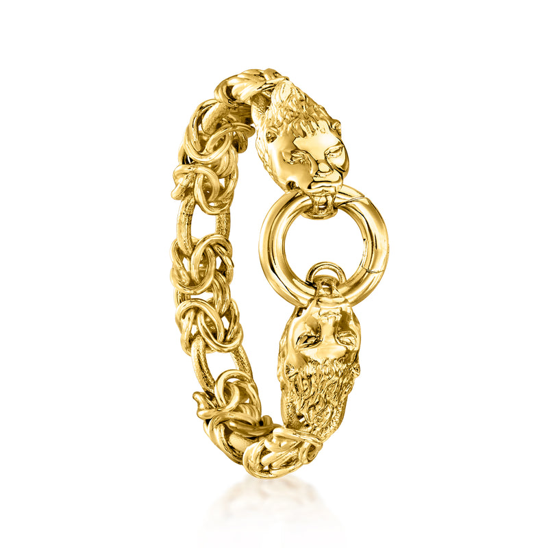 Gold-plated link bracelet with lion head charms and oval ring clasp, side view
