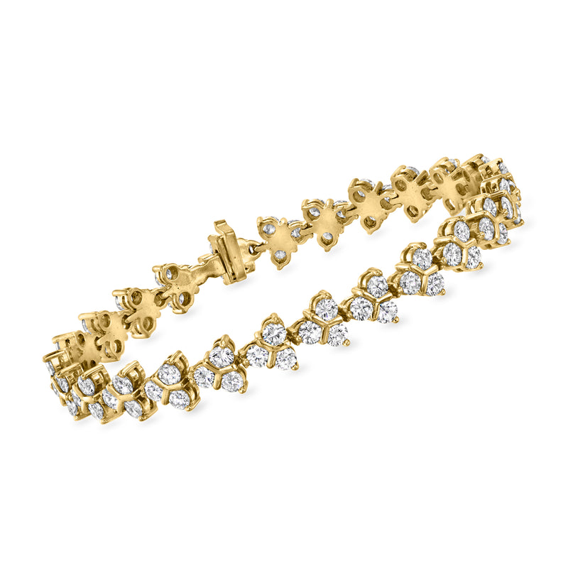Vintage yellow gold diamond cluster bracelet with round prong-set stones