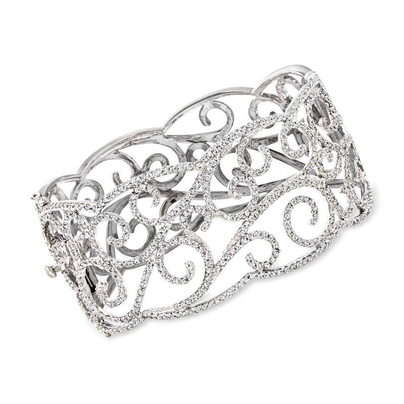 Vintage diamond swirl bangle bracelet in 14kt white gold, openwork design