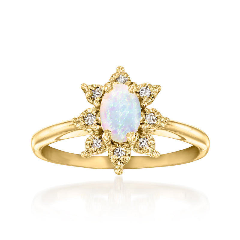 Vintage oval opal and diamond halo ring in 14kt yellow gold