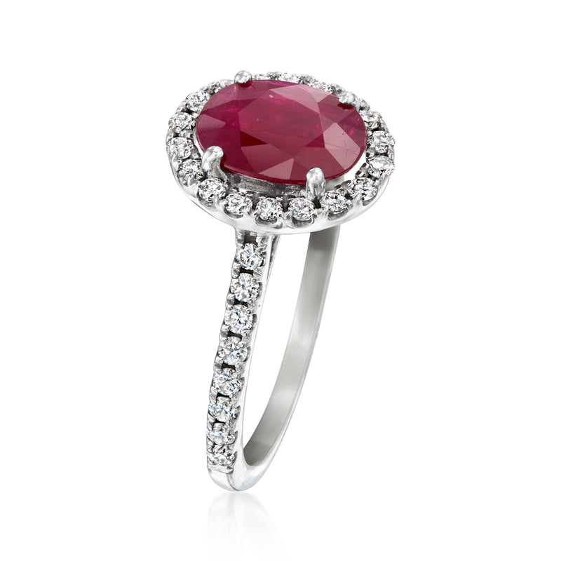 Vintage ruby ring with diamond halo and pavé shank in 14kt white gold