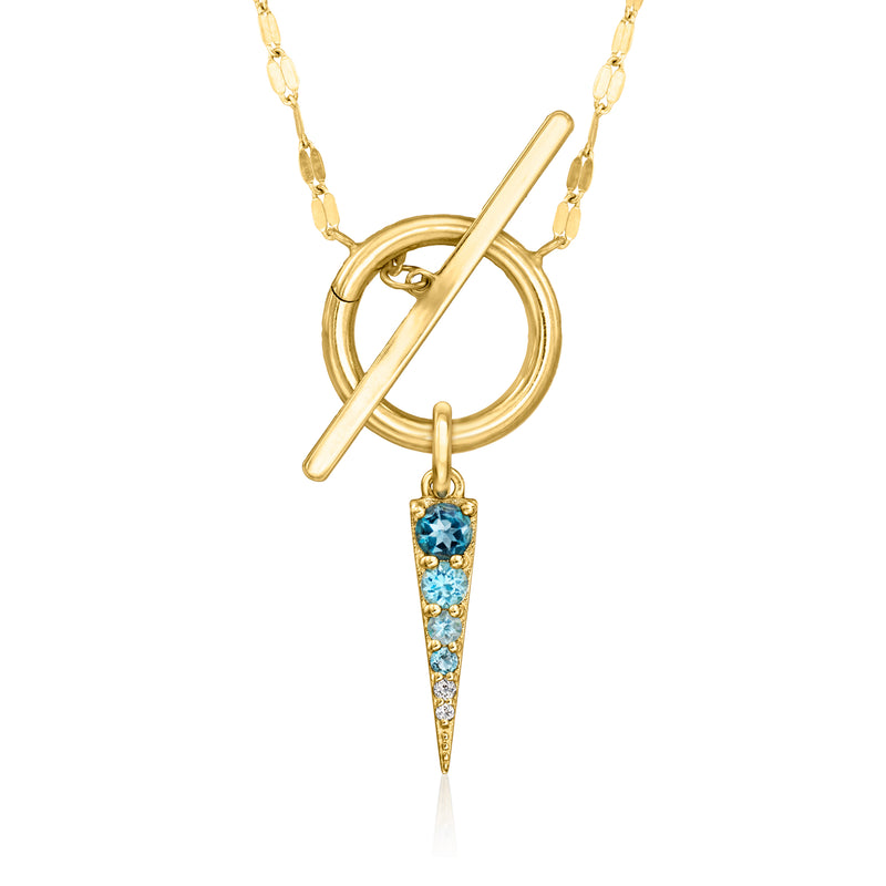 Blue topaz teardrop charm with 14kt yellow gold ring and diagonal bar on chain