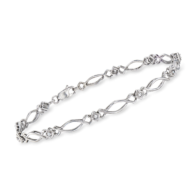 Vintage diamond link bracelet in 10kt white gold with oval and square-cut links