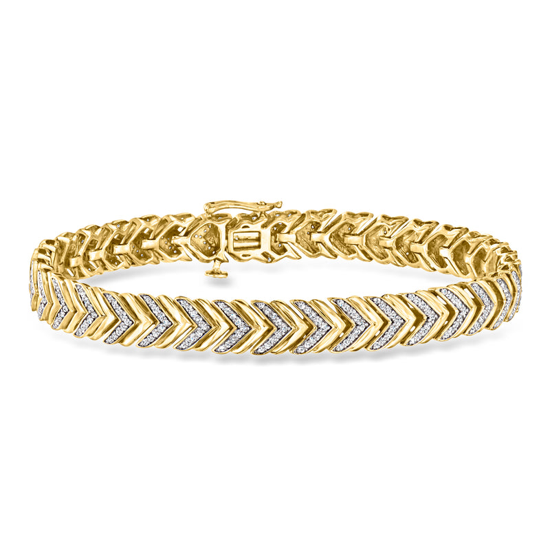 Gold chevron-link diamond bracelet with alternating arrowlike settings