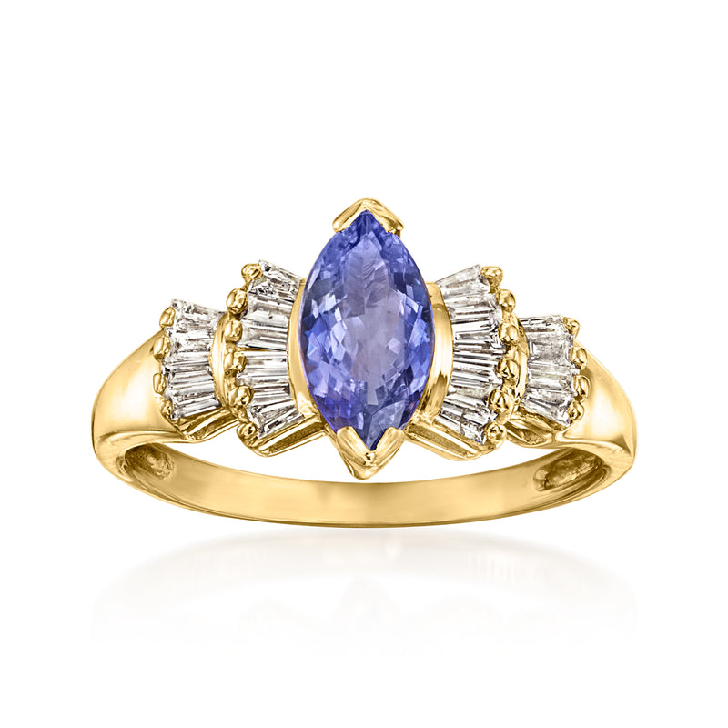 Vintage oval tanzanite ring in 14kt yellow gold with baguette diamond accents