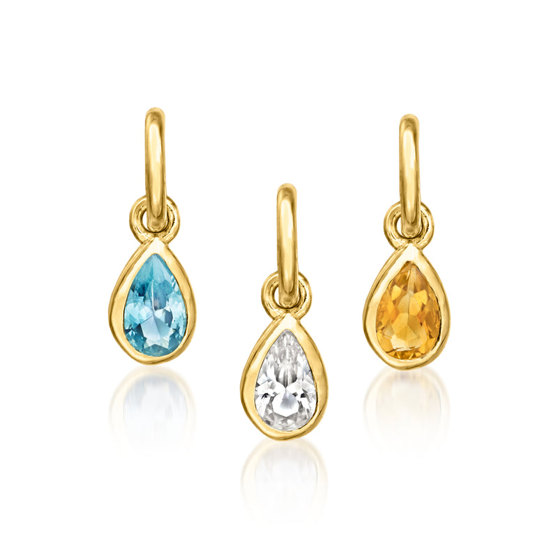 14kt yellow gold charm set with blue, white, and amber pear stones