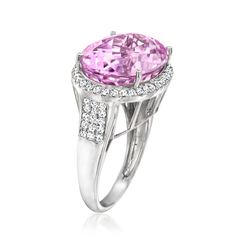 Pink oval kunzite ring with diamond halo, prong-set center and split shank