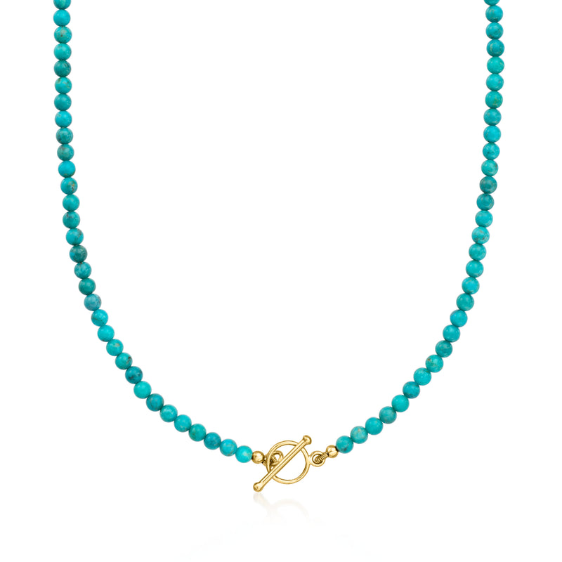 Turquoise bead toggle necklace with gold clasp, shown in a straight view