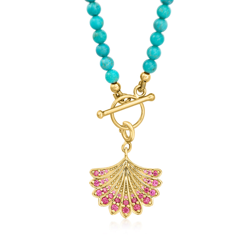 Turquoise beaded necklace with gold toggle and pink-stone shell pendant