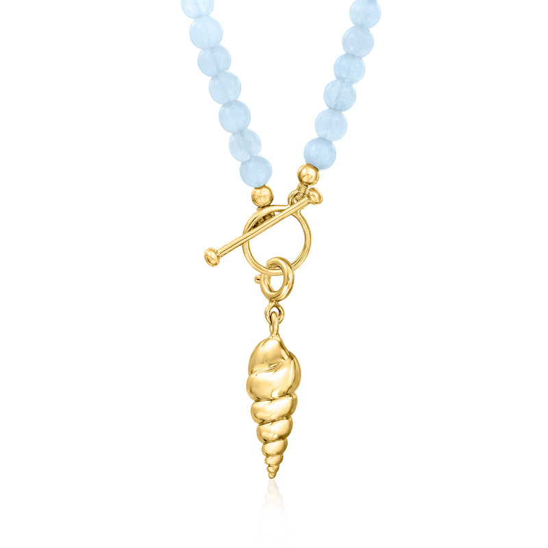 Gold spiral seashell charm necklace with light blue beads and hanging seashell pendant