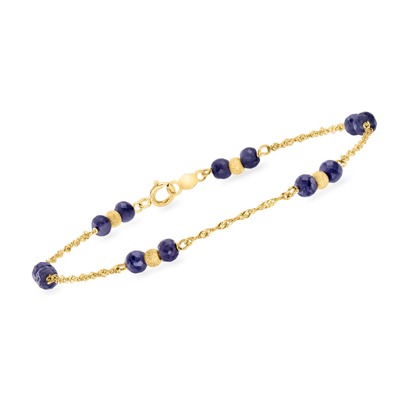 14kt yellow gold bracelet with dark blue sapphire beads and bead stations