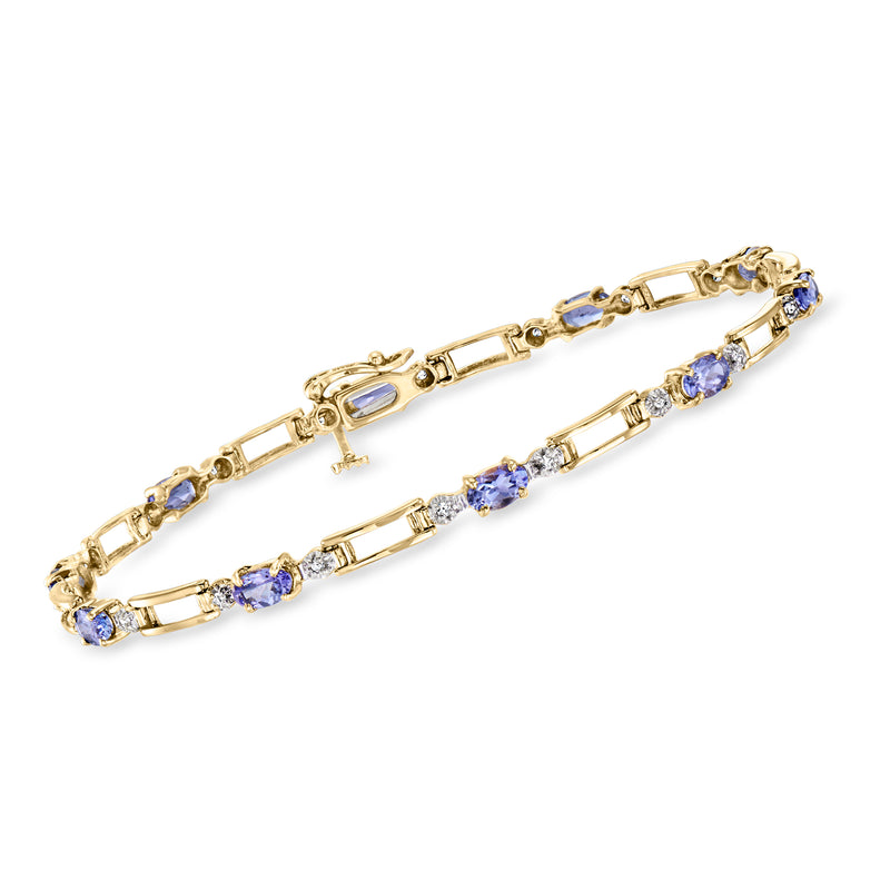10kt yellow gold link bracelet with blue tanzanite stones and diamond accents