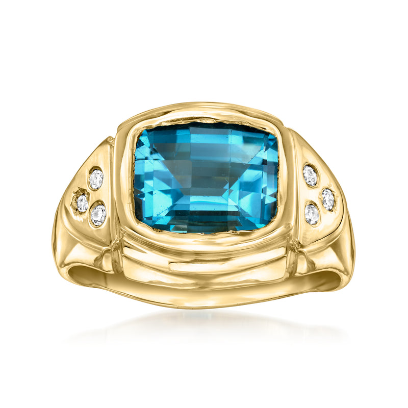 Vintage 14kt yellow gold ring with blue topaz center stone and four diamond accents