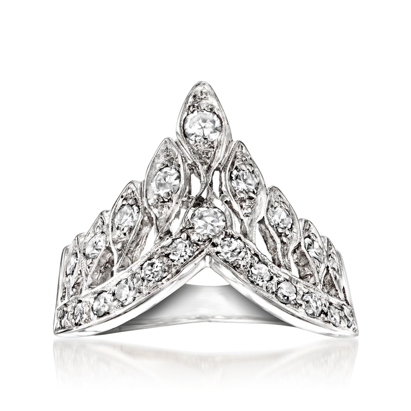 Vintage diamond cluster ring in 14kt white gold with oval center and side stones