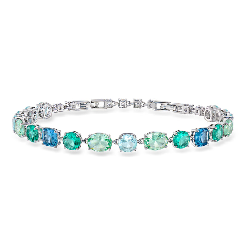 Rhodium-plated bracelet with alternating blue and teal simulated gemstones