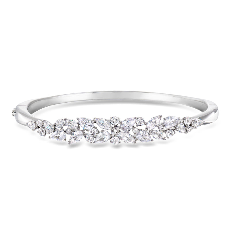 Rhodium-plated bangle bracelet with floral CZ cluster row, clear stones on cuff