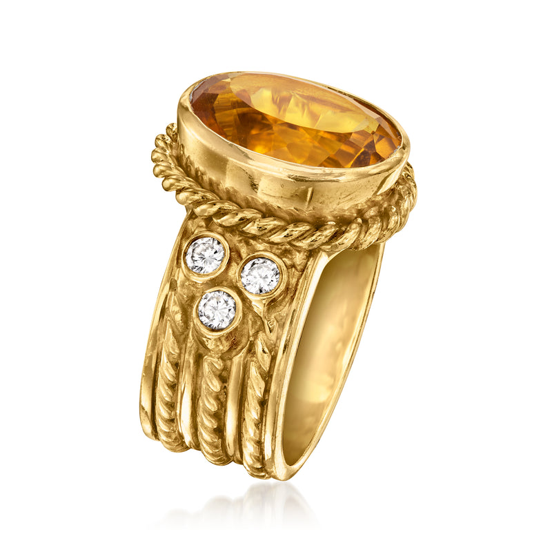 Oval citrine gemstone band with diamond side stones in twisted yellow-gold setting