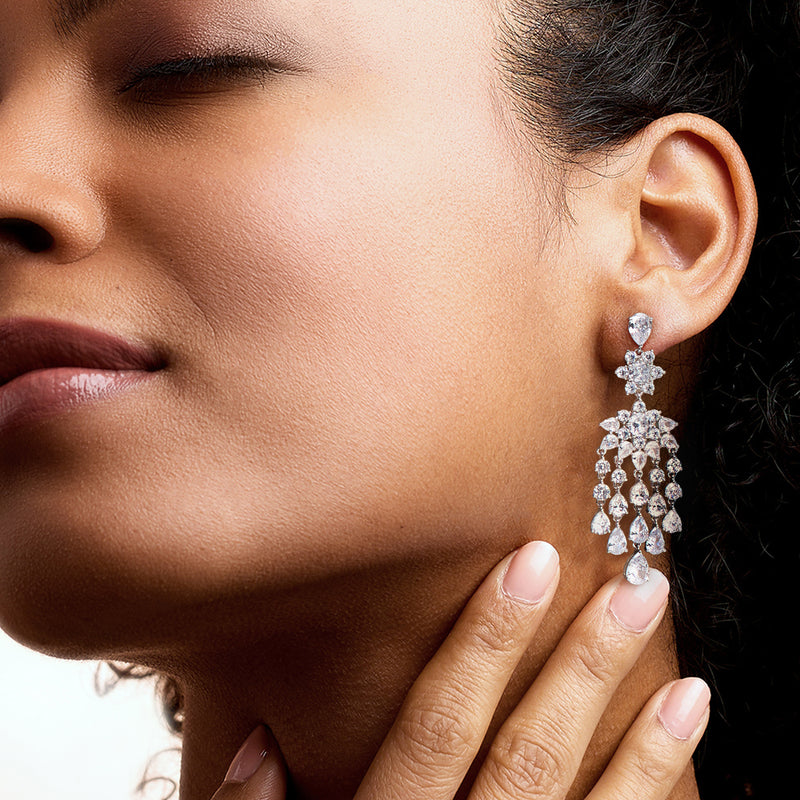 Rhodium-plated chandelier drop earrings with teardrop CZ clusters and heart-shaped top