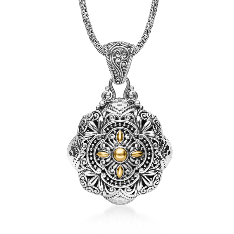 Bali-style floral pendant necklace in sterling silver with yellow gold accents