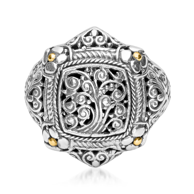 Sterling silver Bali-style ring with ornate filigree, gold accents, and oval center
