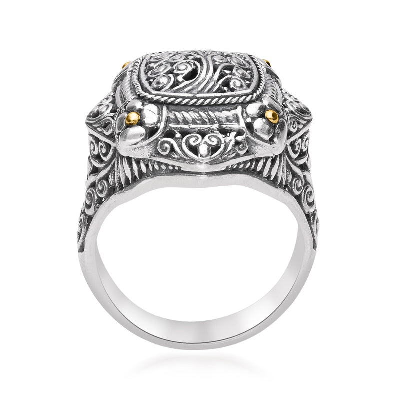 Sterling silver Bali-style ring, front view with detailed oval top and small gold accents