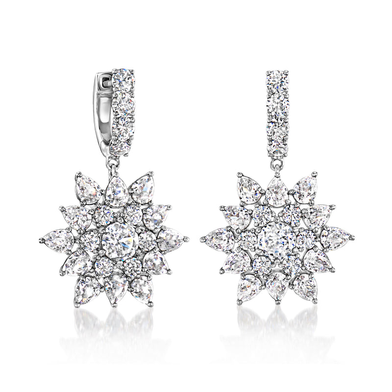 Rhodium-plated hoop drop earrings with CZ floral starburst clusters
