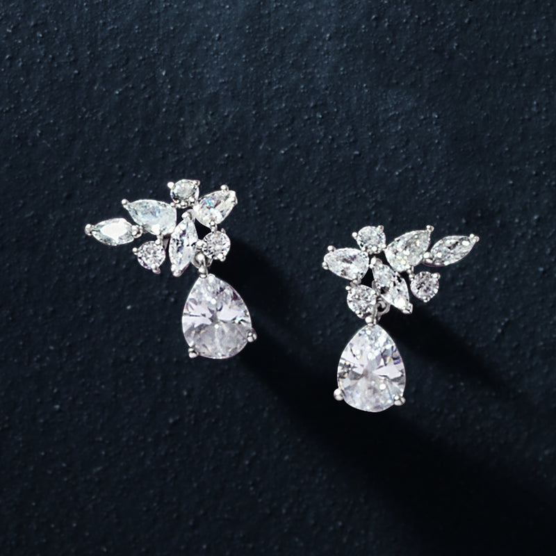 Rhodium-plated CZ drop earrings with clustered marquise stones and pear dangle